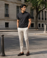 RENQARA Black Polo T-Shirt front fit on male model styled with ivory trousers