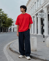 RENQARA Crimson Red Oversized T-Shirt front fit on male model with relaxed streetwear silhouette