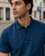 RENQARA Navy Blue Polo T-Shirt close-up on male model showing collar, buttons and sleeve fit