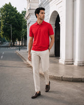 RENQARA Crimson Red Polo T-Shirt front fit on male model styled with ivory trousers