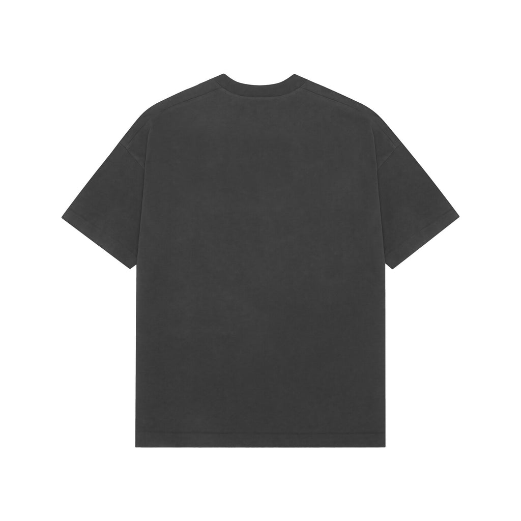 Model wearing Onyx oversized baggy t-shirt in a streetwear setting