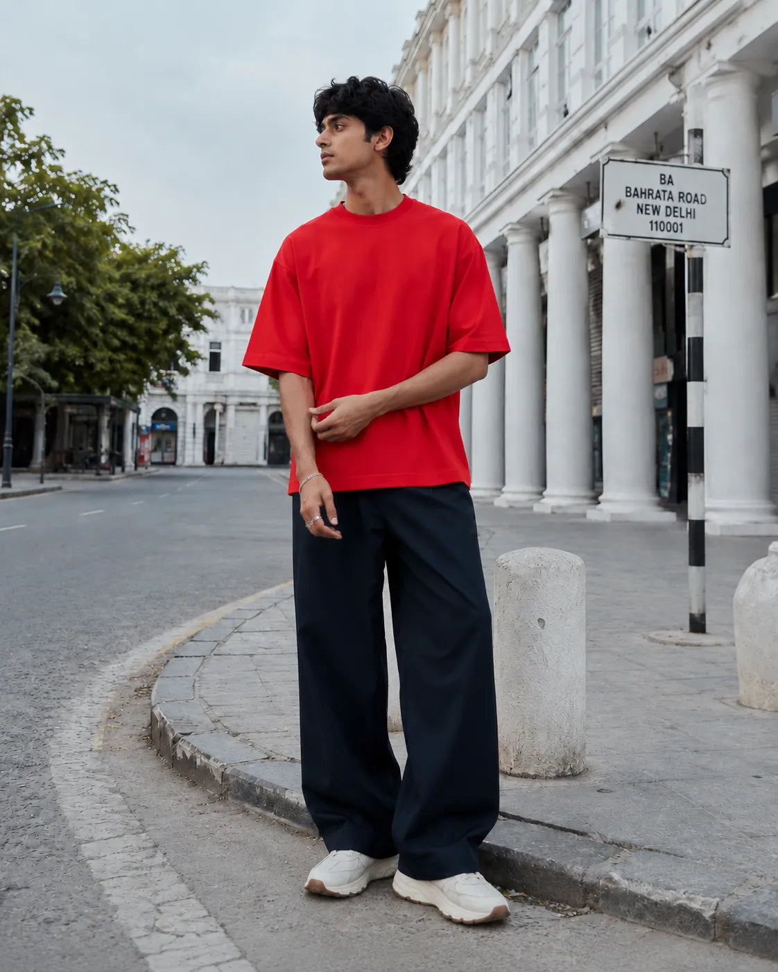 RENQARA Crimson Red Oversized T-Shirt styled with wide-leg trousers in a clean New Delhi street-style look