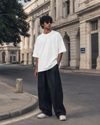 RENQARA Ivory Oversized T-Shirt front fit on male model with relaxed streetwear silhouette