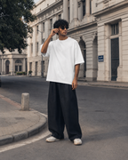 RENQARA Ivory Oversized T-Shirt styled with black wide-leg trousers in a clean street-style look