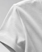 RENQARA Melange Grey Women’s Regular Fit T-Shirt close-up showing cotton texture, sleeve stitching and soft fabric