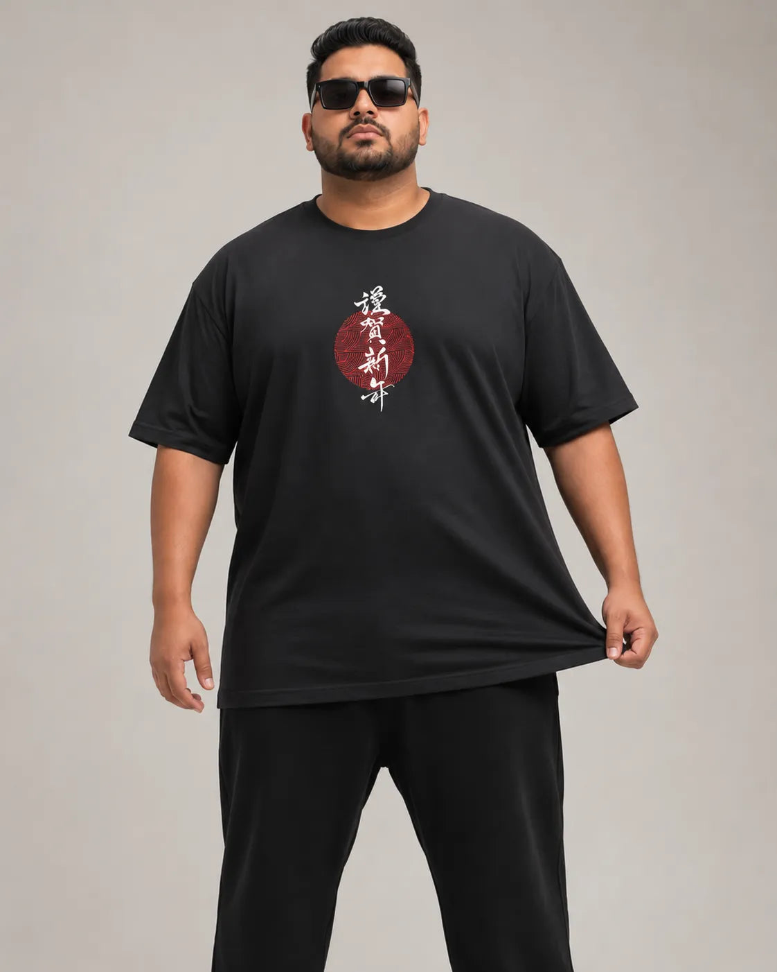 Model wearing the RENQARA Onyx Plus Size Graphic Supima Cotton T-Shirt showing the relaxed fit and Japanese-inspired chest graphic.