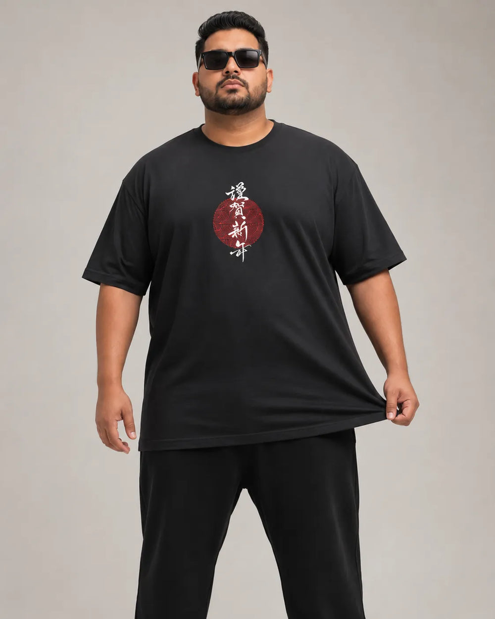 Model wearing the RENQARA Onyx Plus Size Graphic Supima Cotton T-Shirt showing the relaxed fit and Japanese-inspired chest graphic.
