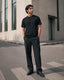 RENQARA Onyx Supima T-Shirt styled with black trousers in a clean urban streetwear look