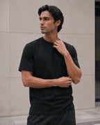 RENQARA Onyx Supima T-Shirt upper body view showing round neck, sleeve fit, and smooth Supima cotton texture