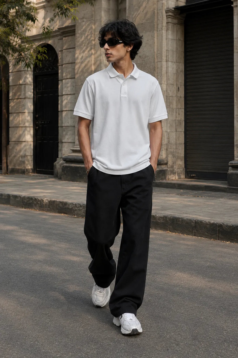 
Model walking in the RENQARA White Polo T-Shirt styled for a modern smart-casual look.