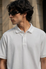 Close-up of the RENQARA White Polo T-Shirt showcasing the classic collar, button placket, and clean fit.