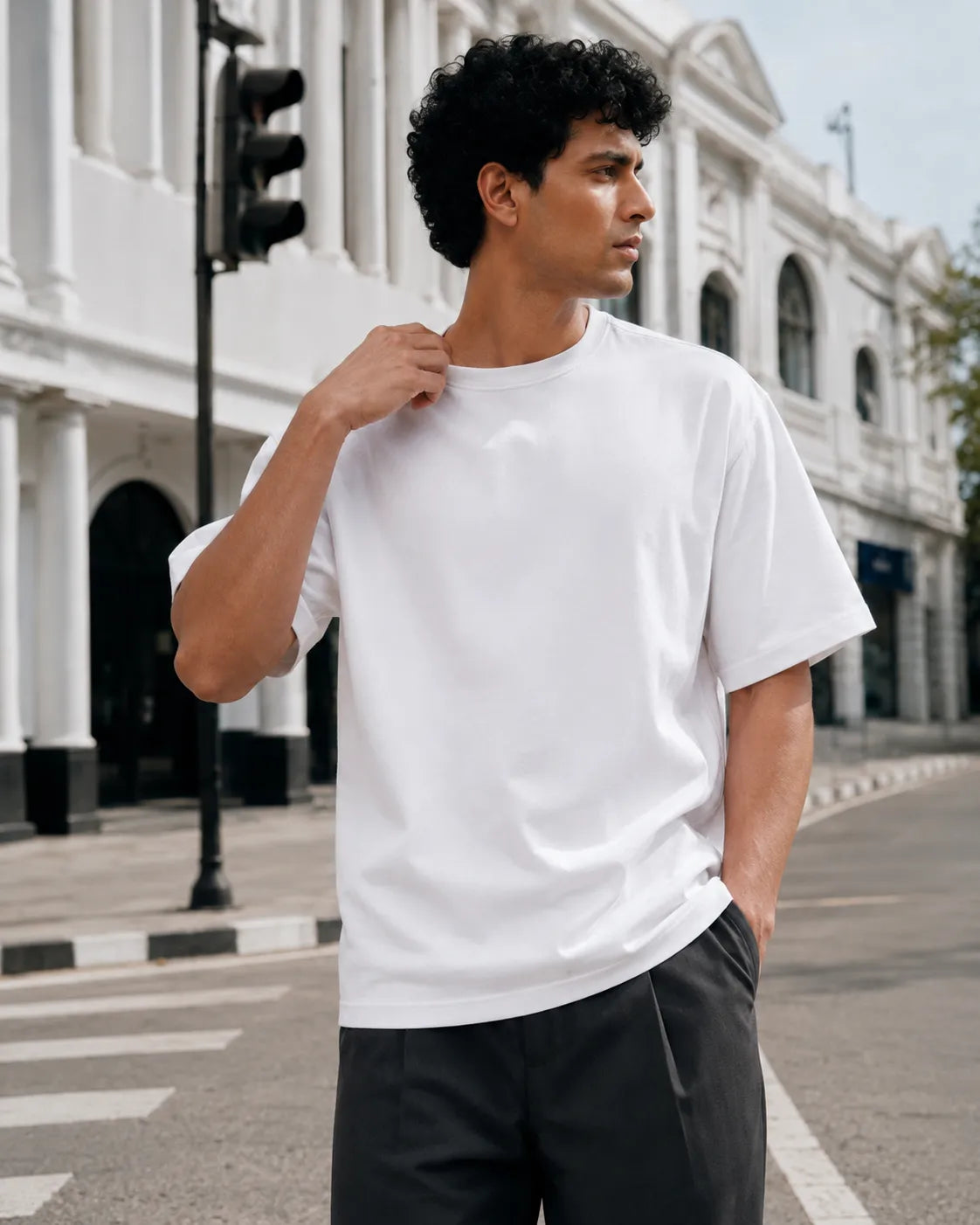 RENQARA White Supima T-Shirt front fit on male model showing clean neckline, sleeve length and smooth Supima cotton