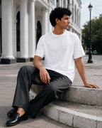 RENQARA White Supima T-Shirt on male model in a seated street-style look with relaxed regular fit