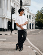 RENQARA White Supima T-Shirt styled with dark trousers in a clean street-style full-body look