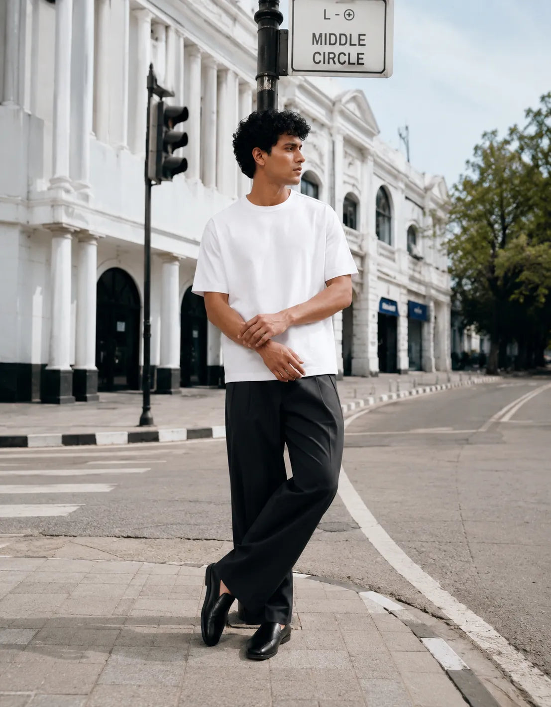 RENQARA White Supima T-Shirt styled with dark trousers in a clean street-style full-body look