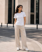 RENQARA White Women’s Regular Fit T-Shirt front view styled with beige trousers and white sneakers