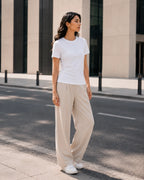RENQARA White Women’s Regular Fit T-Shirt worn in a clean street-style look with beige wide-leg trousers