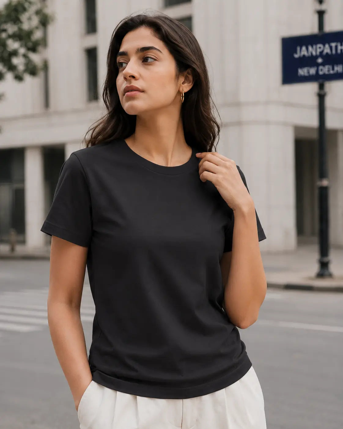 RENQARA Women’s Black Regular Fit T-Shirt upper-body view showing round neck, sleeve fit and clean everyday styling