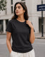 RENQARA Women’s Black Regular Fit T-Shirt upper-body view showing round neck, sleeve fit and clean everyday styling